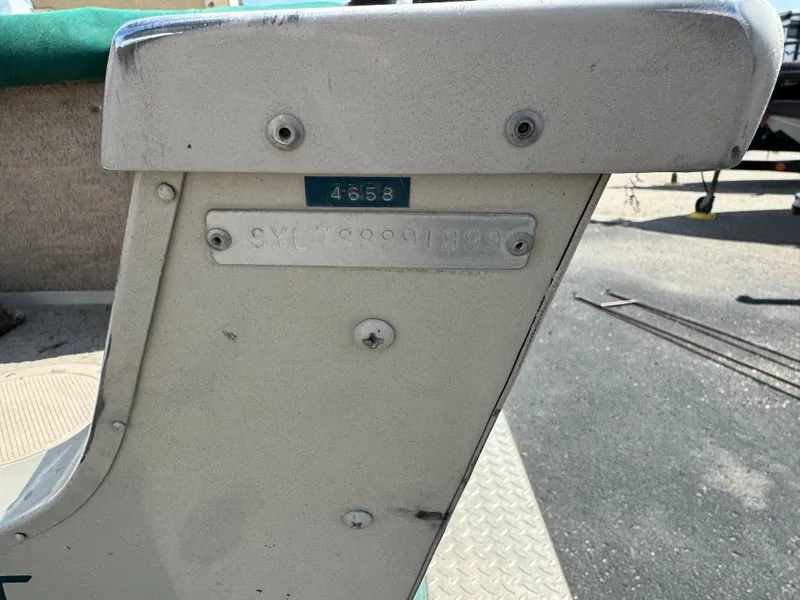 Slide: The Image of 1999 Sylvan 1700 Pro Select boat detail with identification numbers visible. - 5