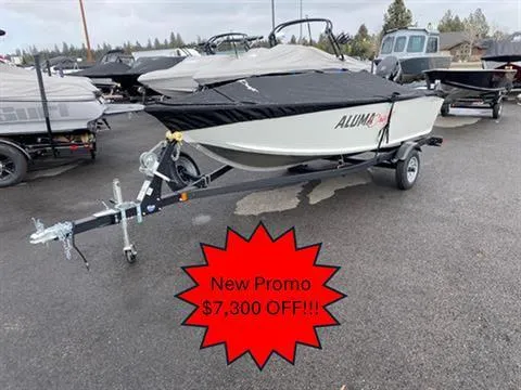 Slide: The Image of 2022 Alumacraft Escape 145 CS boat on trailer, $7,300 discount promotion. - 0