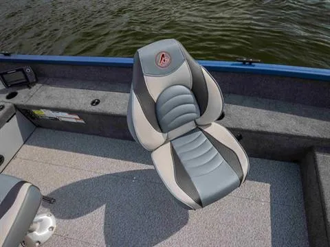 Slide: The Image of 2022 Alumacraft Escape 145 CS boat seat with gray and black design on water. - 14