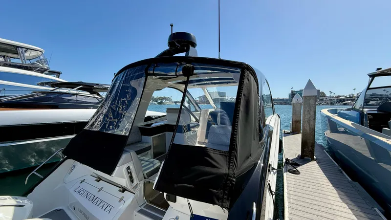 Slide: The Image of 2022 Sea Ray Sundancer 370 OB docked, featuring sleek design and modern amenities. - 33