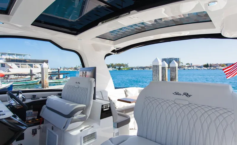 Slide: The Image of Interior view of 2022 Sea Ray Sundancer 370 OB yacht with waterfront backdrop. - 39