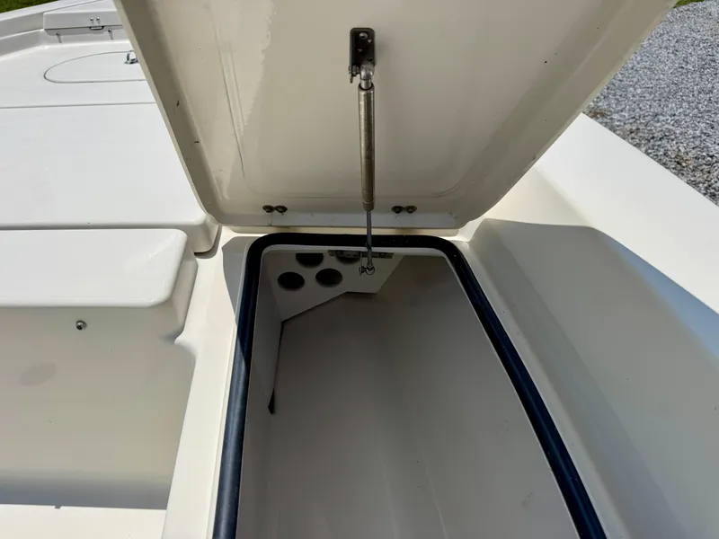 Slide: The Image of Open storage compartment on 2011 Pathfinder 2400 Tournament Edition boat. - 21