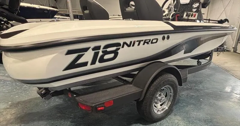 Slide: The Image of 2025 Nitro Z18 boat on trailer in showroom setting. - 4
