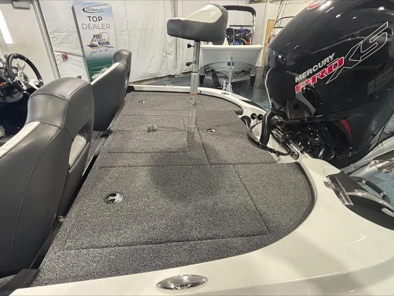 Slide: The Image of 2025 Nitro Z18 boat with Mercury Pro XS engine in showroom. - 9