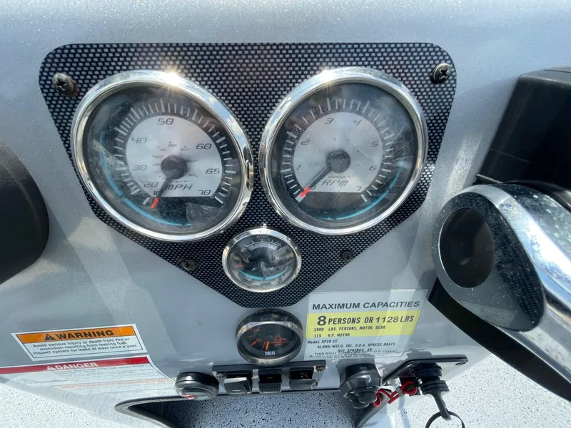 Slide: The Image of Dashboard of 2019 Xpress XP20CC boat showing speedometer and RPM gauges. - 20