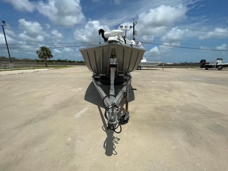 Slide: The Image of 2019 Xpress XP20CC boat on trailer under cloudy sky. - 5