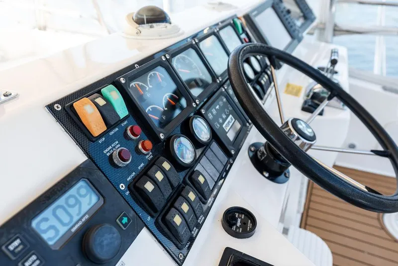 Slide: The Image of Navigation system on 2001 Riviera 48 boat with dual display screens. - 34