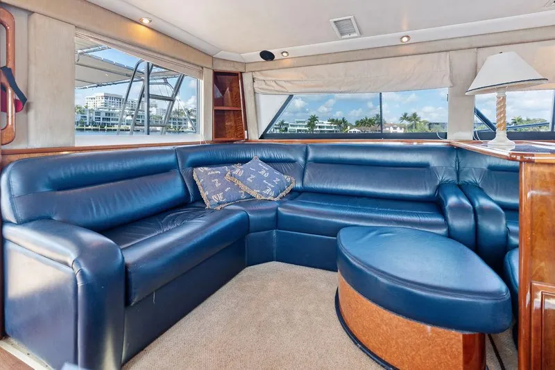 Slide: The Image of Interior of 2001 Riviera 48 yacht kitchen with wood finish and modern appliances. - 42