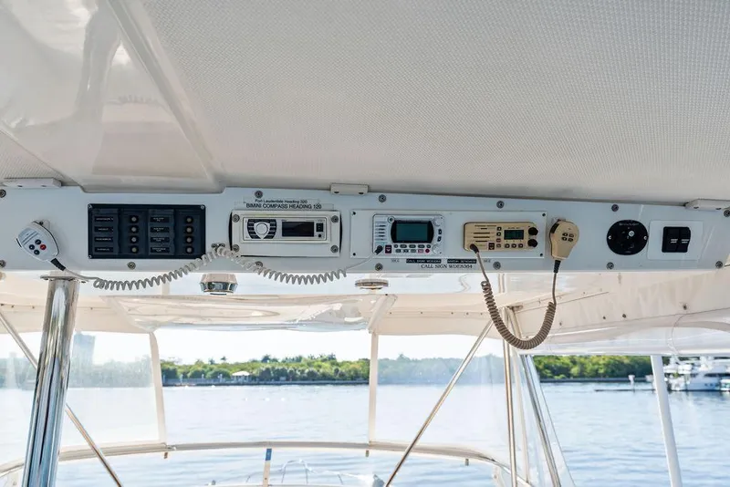 Slide: The Image of Navigation system on a 2001 Riviera 48 boat displaying a detailed marine map. - 36