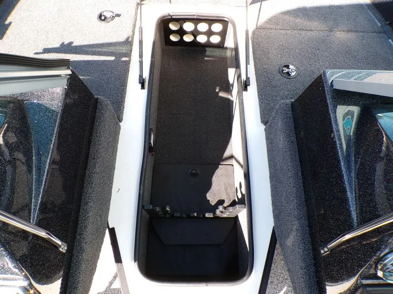 Slide: The Image of 2017 Ranger VS1780 boat interior with open storage compartment. - 17