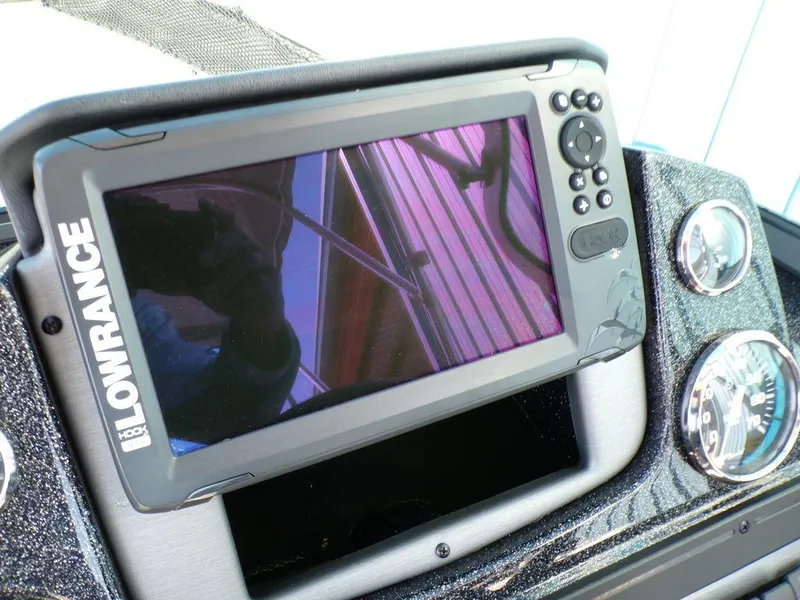 Slide: The Image of Lowrance fishfinder on 2017 Ranger VS1780 boat dashboard with gauges. - 4