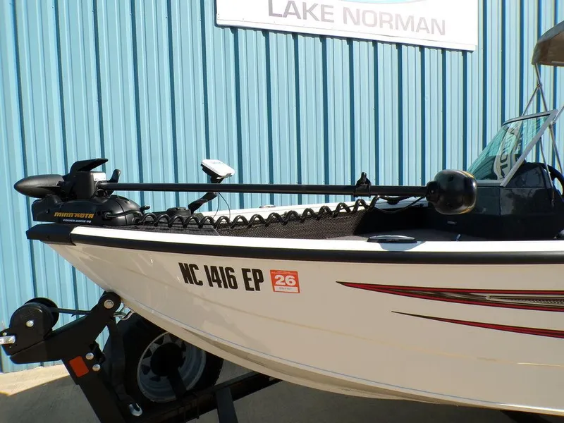 Slide: The Image of 2017 Ranger VS1780 boat with trolling motor, parked near Lake Norman sign. - 9