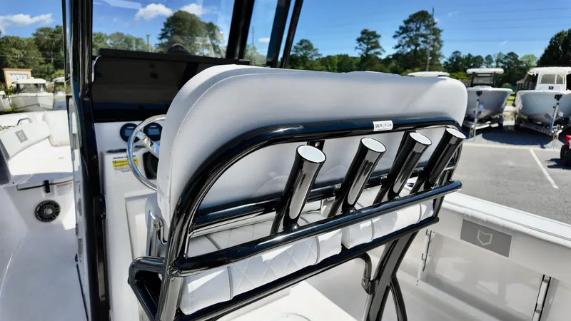 Slide: The Image of 2025 Sea Fox 248 Commander boat interior with rod holders and seating. - 13