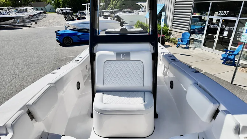 Slide: The Image of 2025 Sea Fox 248 Commander boat interior with white seating and modern design. - 19