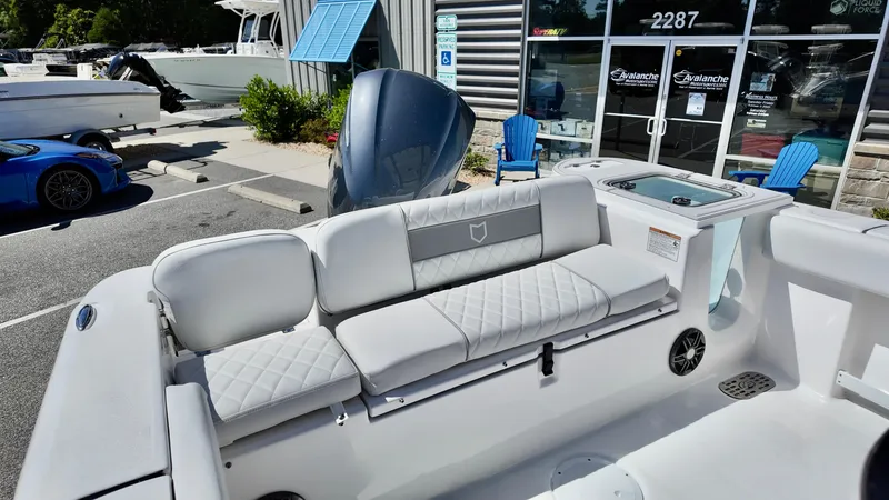 Slide: The Image of 2025 Sea Fox 248 Commander boat interior with cushioned seating and modern design. - 5