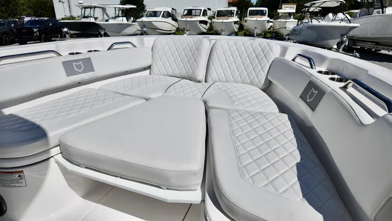 Slide: The Image of 2025 Sea Fox 248 Commander boat interior with quilted seating and modern design. - 6