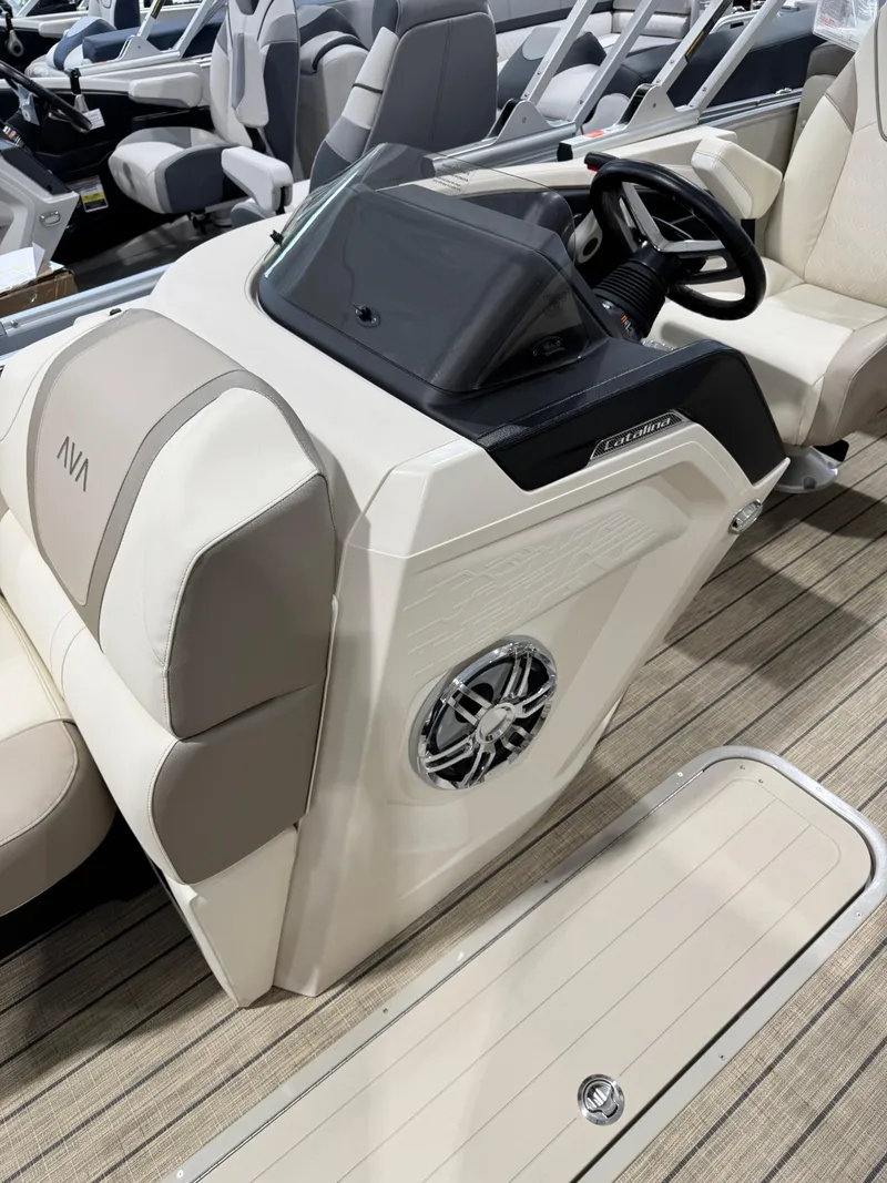 Slide: The Image of 2025 Avalon 2585 25 Catalina ENT boat interior with sleek helm and modern design. - 7
