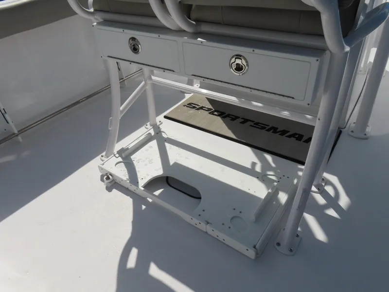 Slide: The Image of 2023 Sportsman Heritage 231 Center Console boat interior with storage compartments. - 30