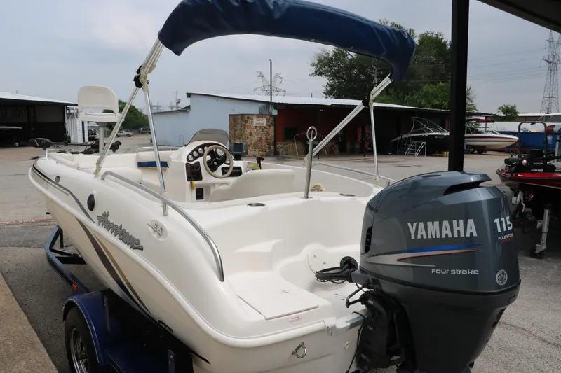 Slide: The Image of 2006 Hurricane GS 172 boat with Yamaha 115 engine, parked outdoors. - 3