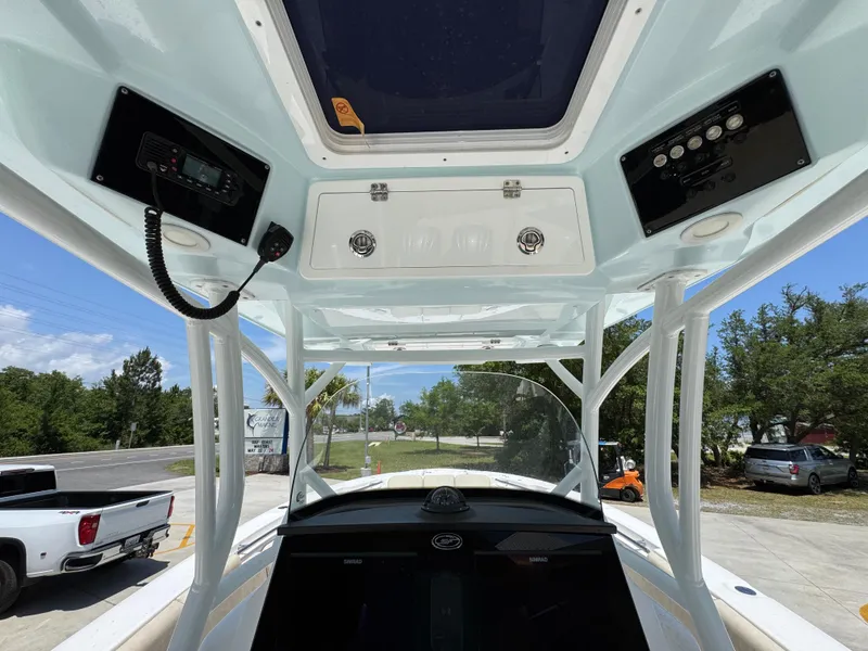 Slide: The Image of Interior view of 2022 Sea Fox 288 Commander boat's helm with control panels. - 39