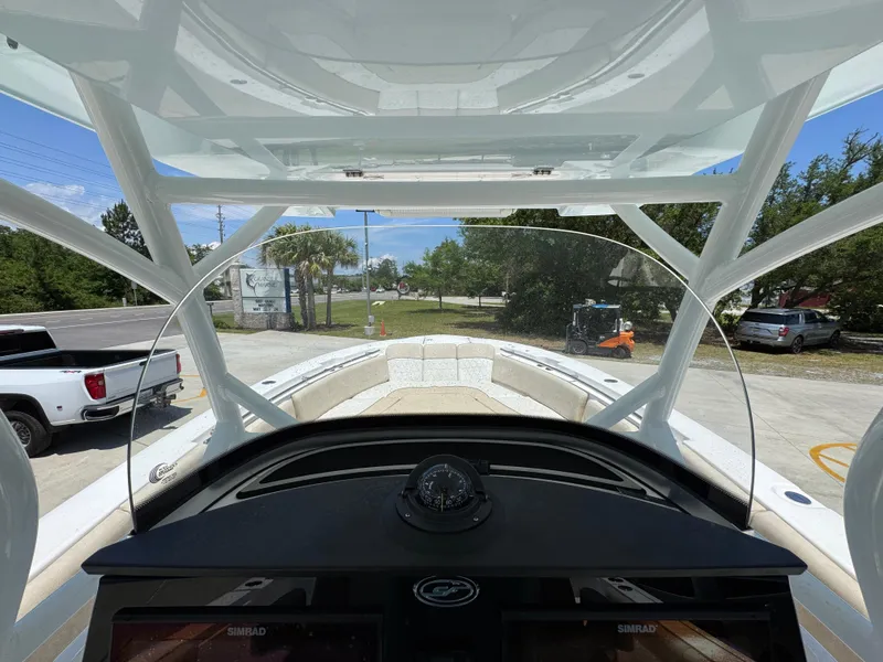 Slide: The Image of 2022 Sea Fox 288 Commander boat interior with helm view and windshield. - 40