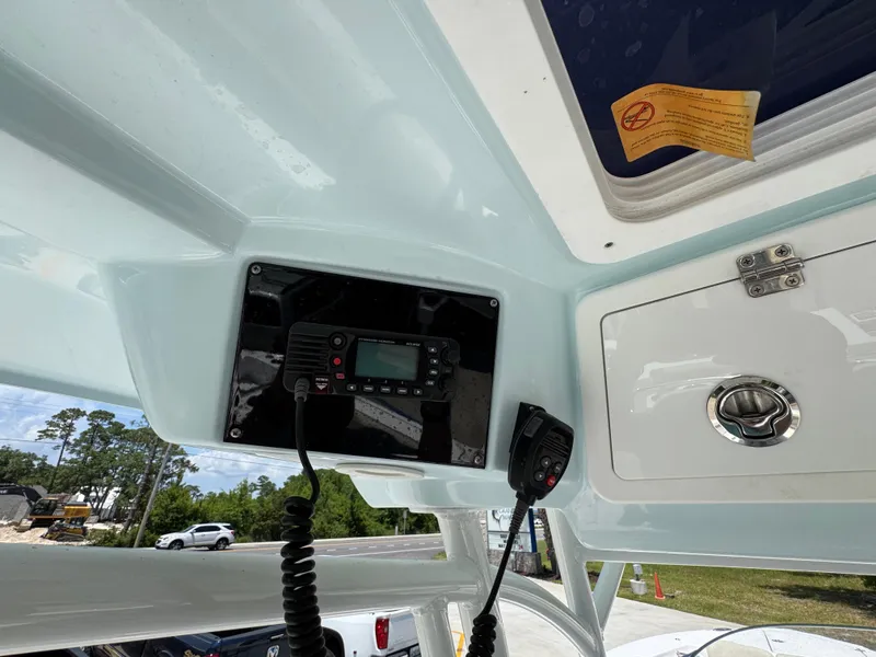 Slide: The Image of 2022 Sea Fox 288 Commander boat interior with radio and storage compartment. - 42