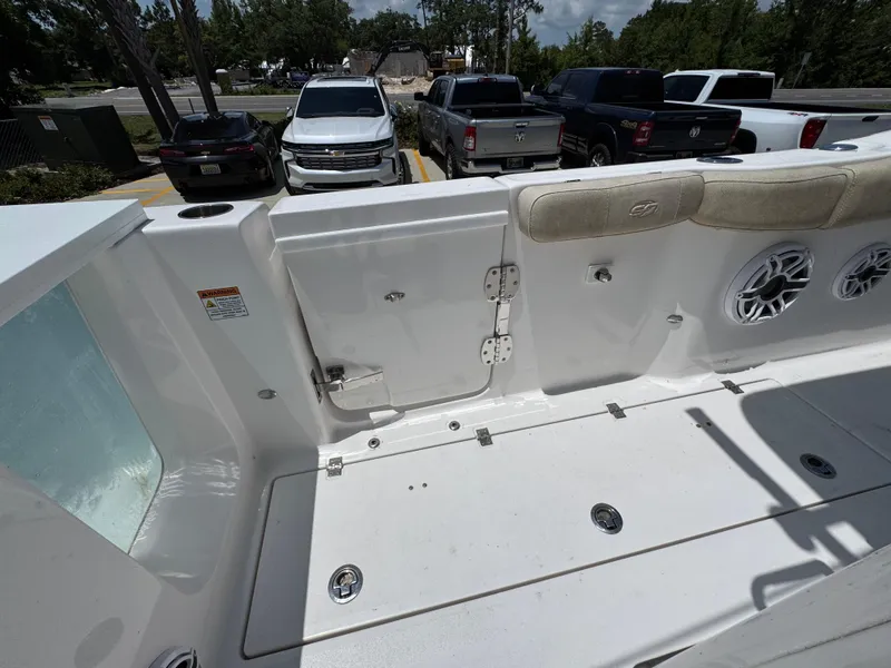 Slide: The Image of 2022 Sea Fox 288 Commander boat interior with seating and storage compartments. - 45