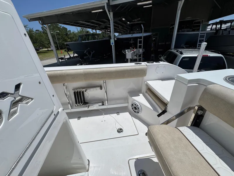 Slide: The Image of 2022 Sea Fox 288 Commander boat interior with seating and storage compartments. - 46