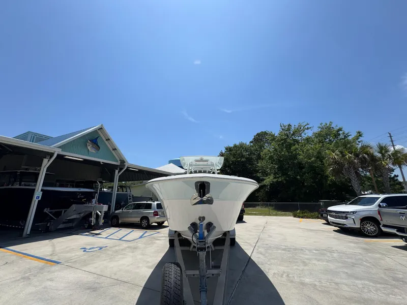 Slide: The Image of 2022 Sea Fox 288 Commander boat on trailer in sunny outdoor setting. - 8