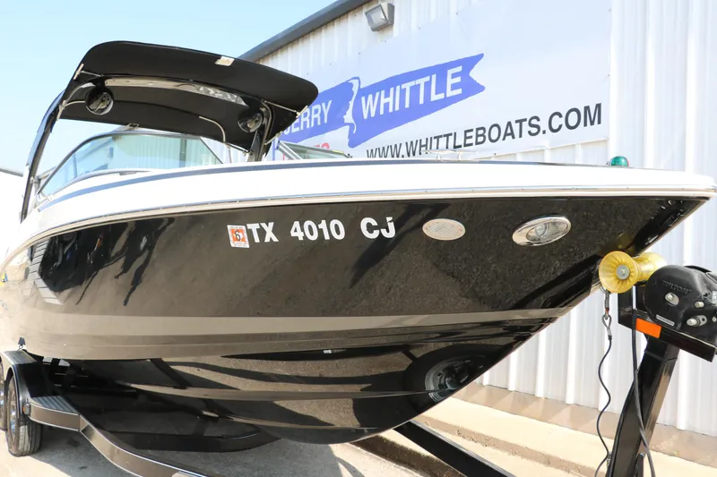 Slide: The Image of 2014 Regal 2500 RX Bowrider boat on trailer, displayed at Whittle Boats dealership. - 11