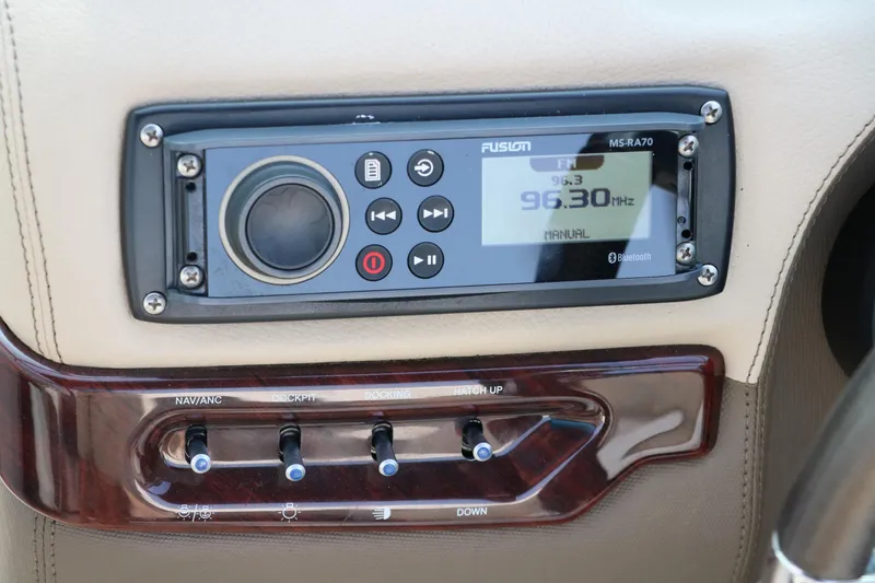 Slide: The Image of 2014 Regal 2500 RX Bowrider dashboard with Fusion marine stereo system. - 33