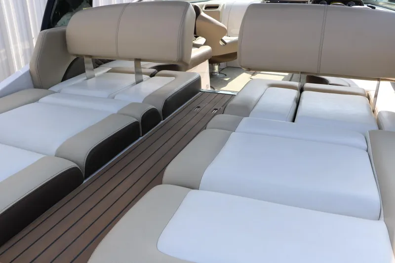 Slide: The Image of 2014 Regal 2500 RX Bowrider interior with beige and white seating. - 34