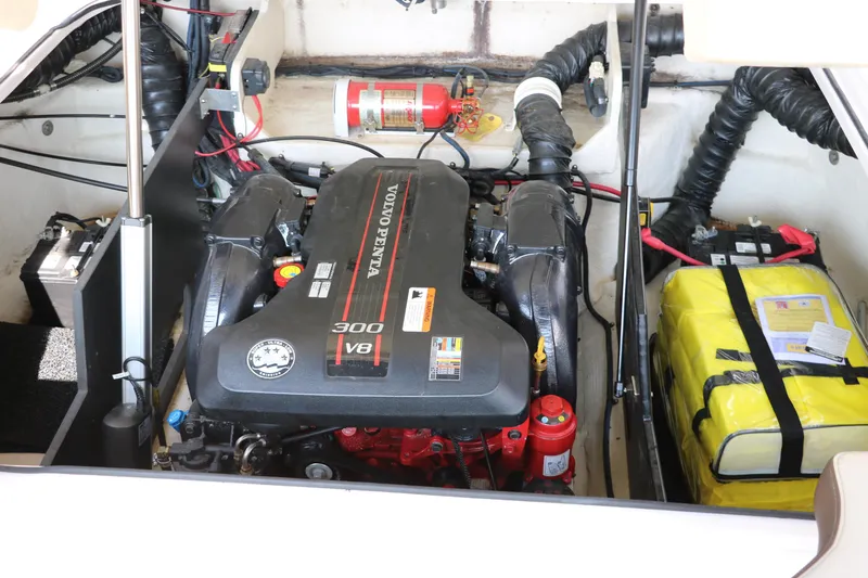 Slide: The Image of 2014 Regal 2500 RX Bowrider engine compartment with Volvo Penta V8 engine and safety equipment. - 37