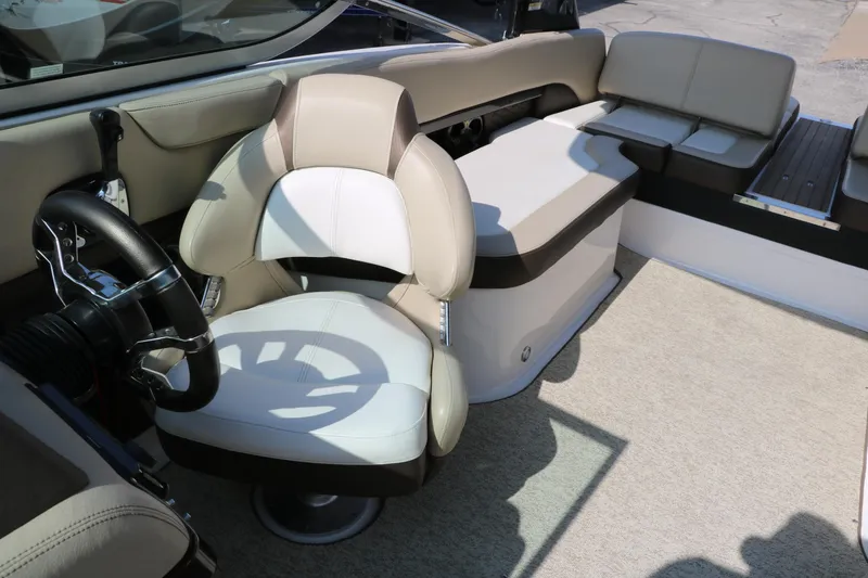 Slide: The Image of 2014 Regal 2500 RX Bowrider interior with steering wheel and seating. - 39