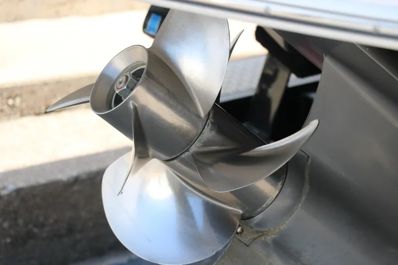 Slide: The Image of Stainless steel propeller of 2014 Regal 2500 RX Bowrider boat. - 5