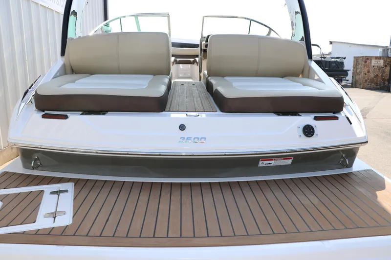 Slide: The Image of 2014 Regal 2500 RX Bowrider with spacious seating and sleek design. - 6