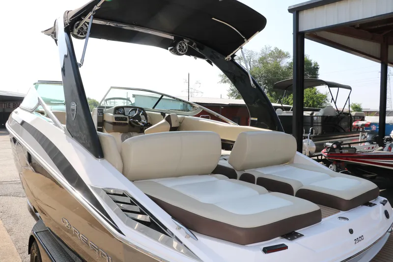 Slide: The Image of 2014 Regal 2500 RX Bowrider with spacious seating and sleek design. - 8
