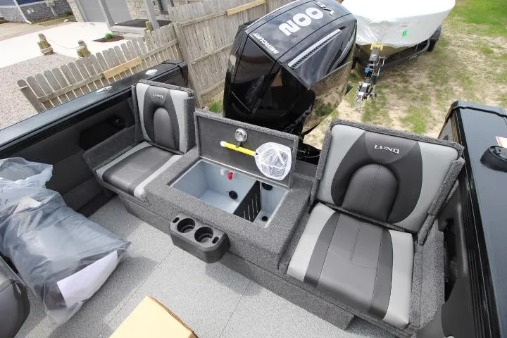 Slide: The Image of 2025 Lund 2075 Tyee boat interior with seating and storage compartments. - 5