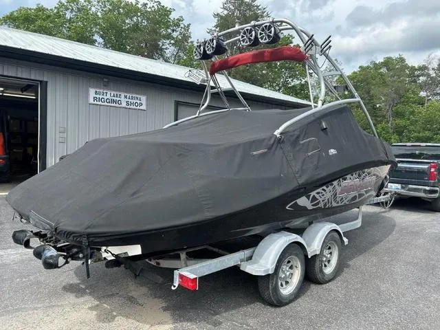 Slide: The Image of 2008 BRP Sea Doo WAKE 230 Jetboat Twin on trailer, covered, outside rigging shop. - 4