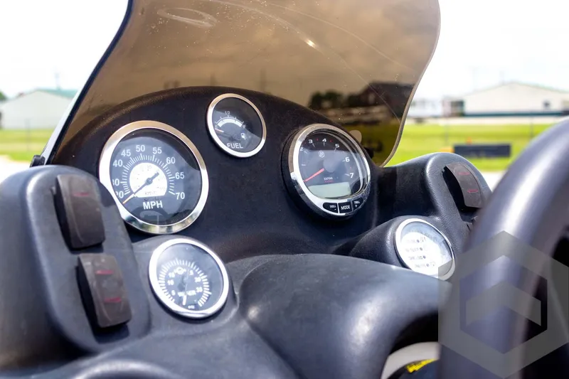 Slide: The Image of Dashboard of 2008 Xpress HD18SCA boat with speedometer and fuel gauge. - 20