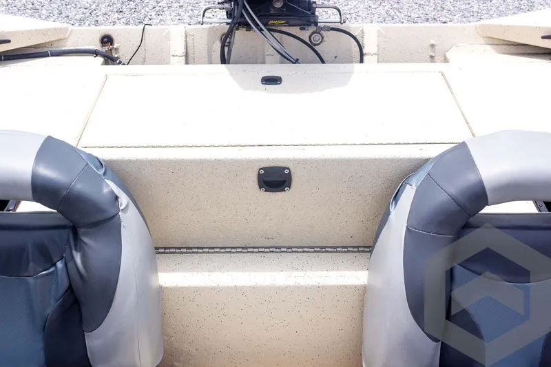 Slide: The Image of 2008 Xpress HD18SCA boat interior with dual seats and control panel. - 25