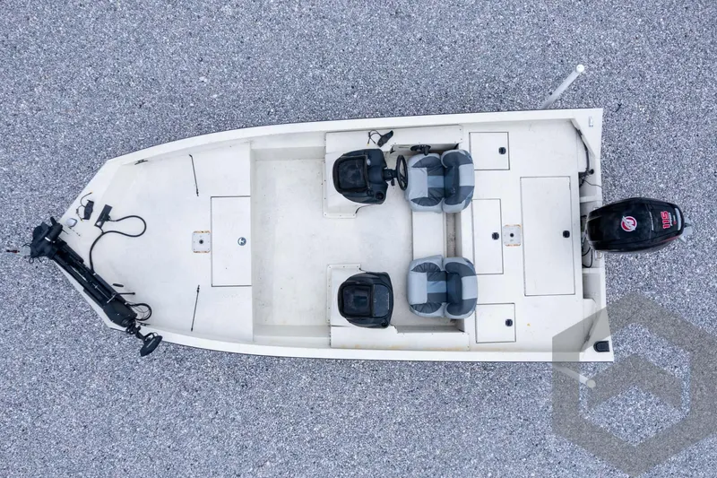 Slide: The Image of Overhead view of 2008 Xpress HD18SCA boat on gravel surface. - 32