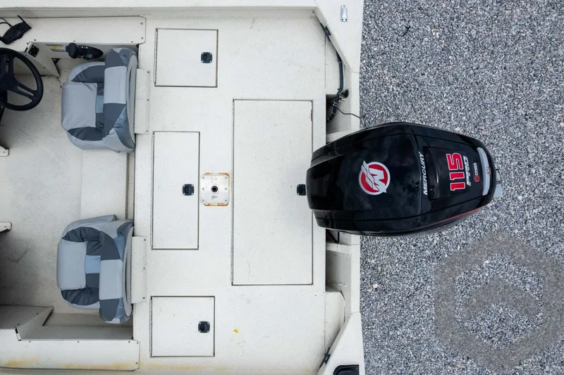 Slide: The Image of 2008 Xpress HD18SCA boat interior with dual seats and 115 horsepower outboard motor. - 35