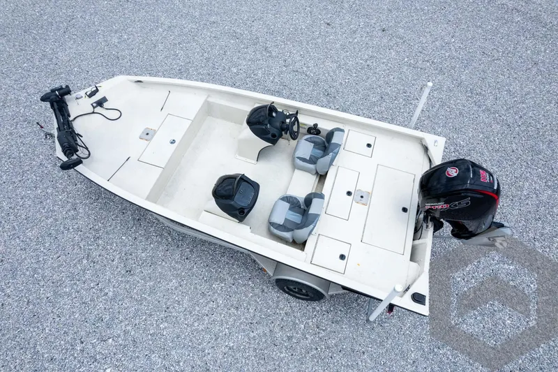 Slide: The Image of 2008 Xpress HD18SCA boat with motor, two seats, and steering console on gravel surface. - 42