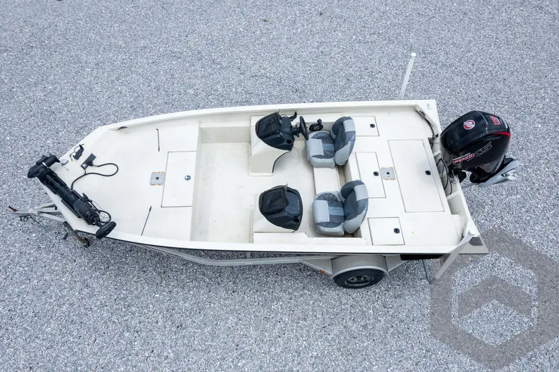 Slide: The Image of 2008 Xpress HD18SCA boat with motor, aerial view on gravel surface. - 43