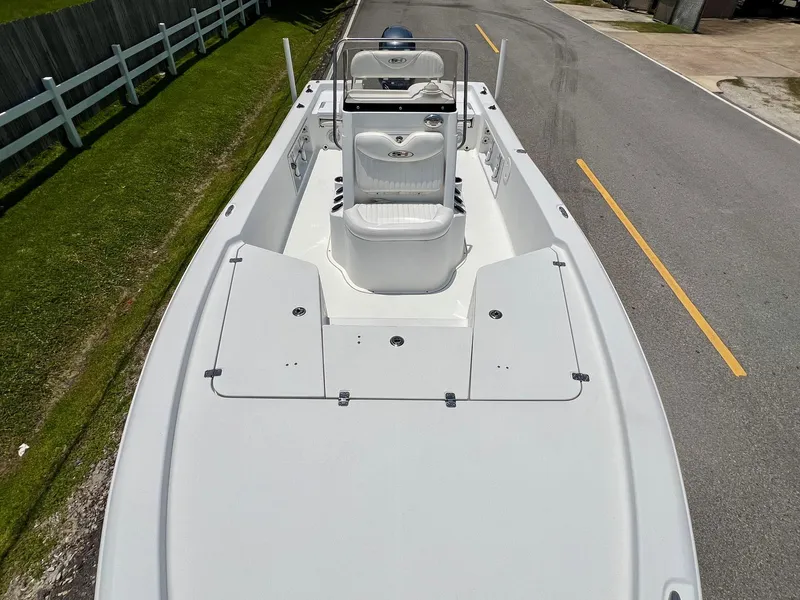 Slide: The Image of 2010 Sea Hunt BX22 Pro boat on a road, top view. - 15