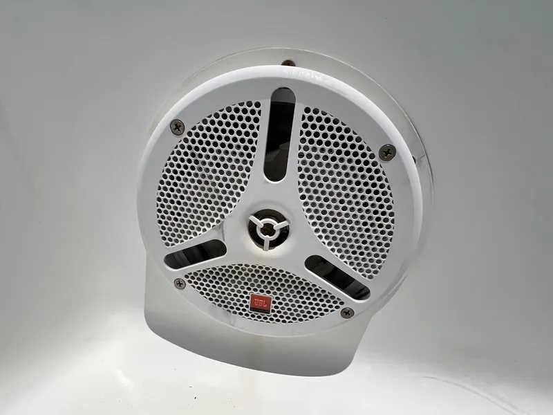 Slide: The Image of White JBL marine speaker on a 2010 Sea Hunt BX22 Pro boat. - 17