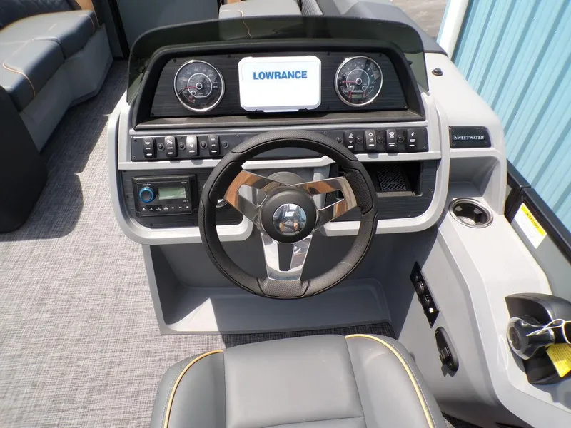 Slide: The Image of Steering console of 2025 Godfrey Sweetwater 2286 SFL boat with Lowrance display. - 10