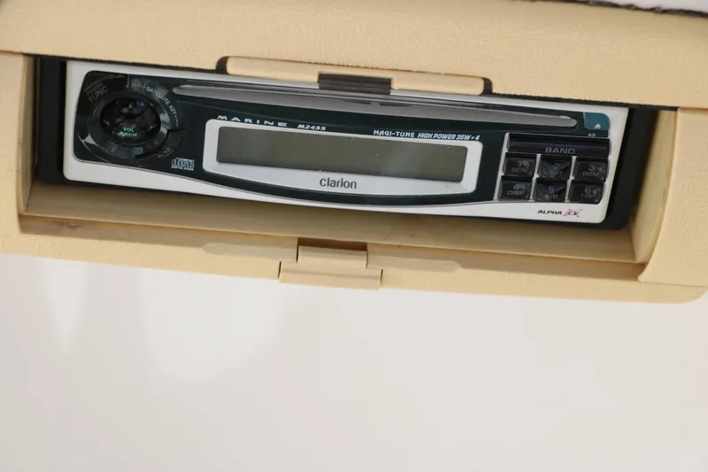 Slide: The Image of Dashboard of a 2000 Chris-Craft 232 boat with gauges and controls. - 33