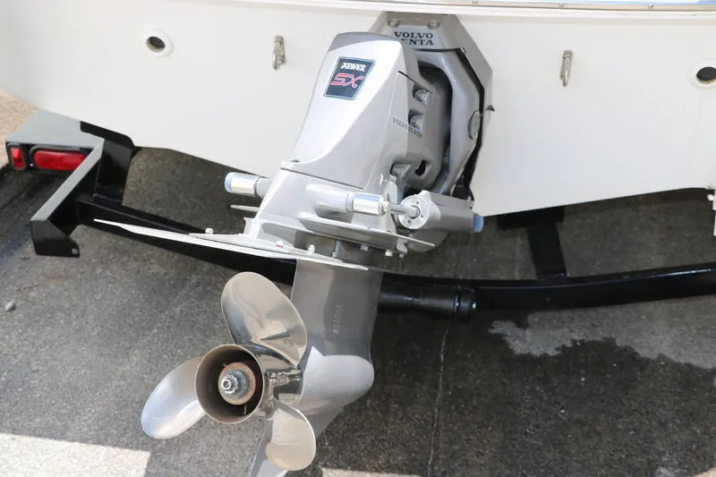 Slide: The Image of Rear view of 2000 Chris-Craft 232 boat with Volvo Penta SX outdrive. - 6
